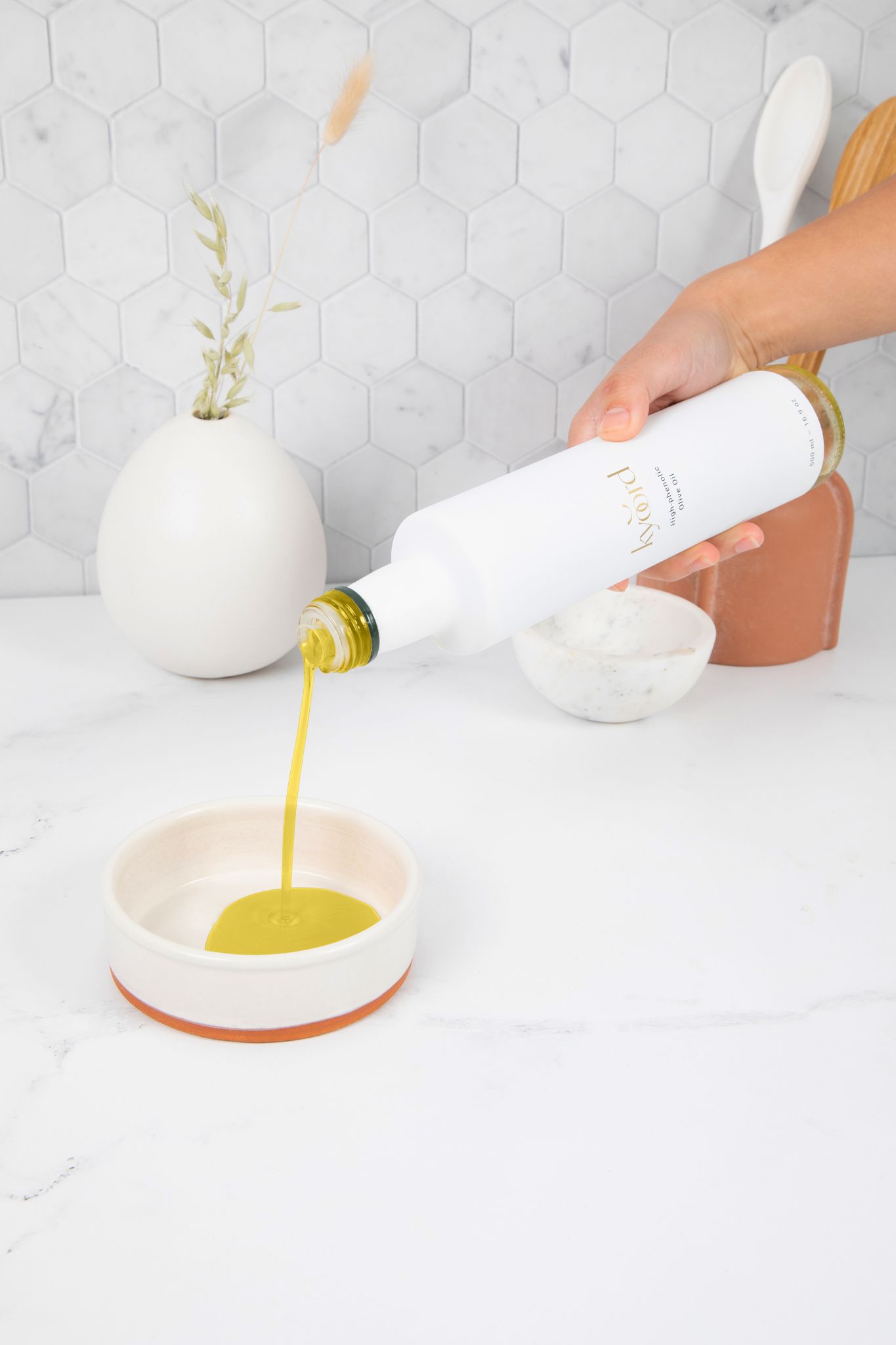 kyoord extra virgin olive oil styled for a gourmet table